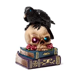 Crow Perched on LED Skull & Books